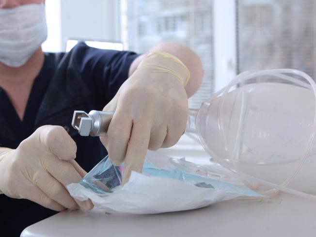 surgical instrument package being opened
